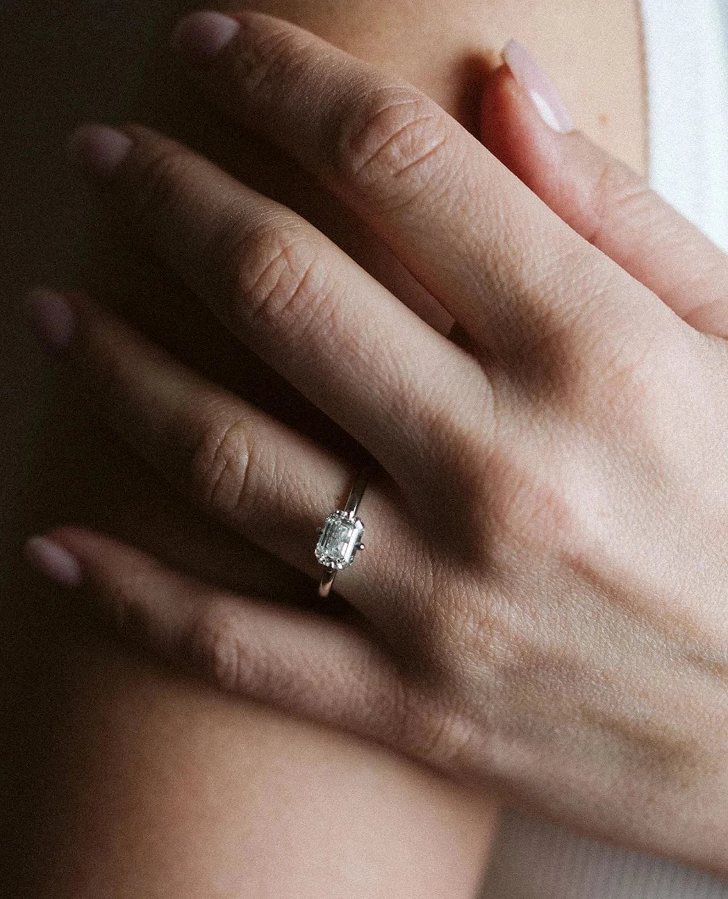 East-West Solitaire Engagement Ring 1.50 Carat Lab-grown Emerald Cut Diamond | 14kt White Gold