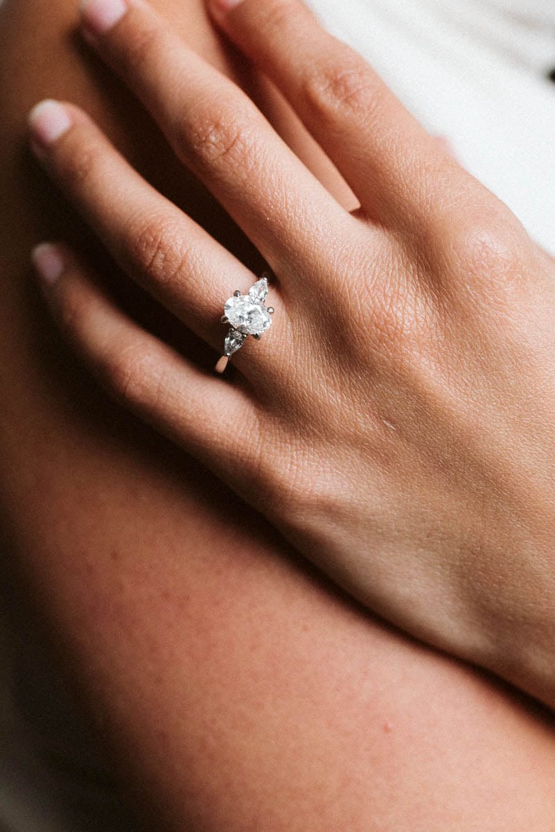 Three Stone GIA Certified Engagement Ring 1.94 Carat TW Oval & Pear Shape Diamond | 18kt White Gold & Platinum