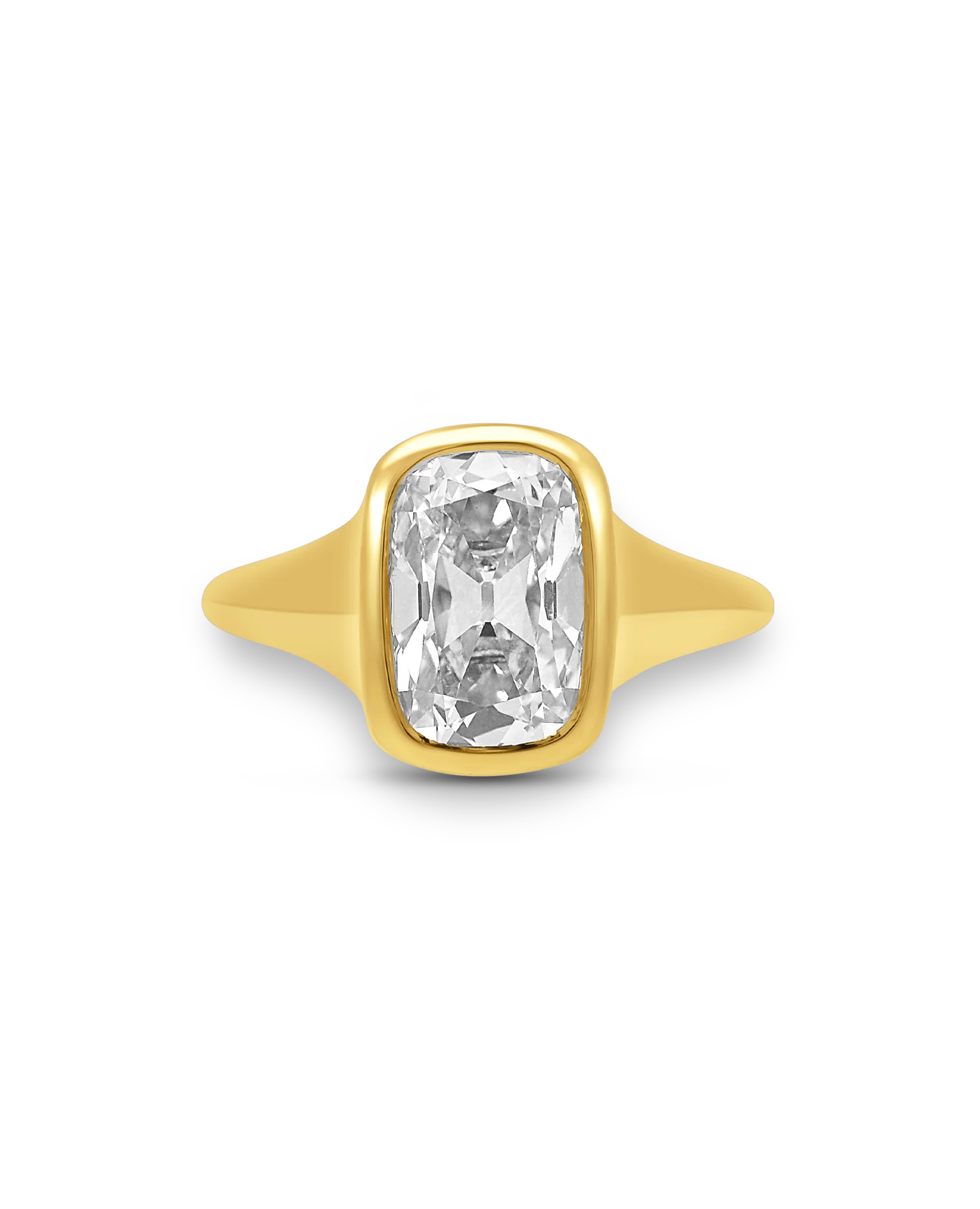 Gold ring with a large diamond on a white background