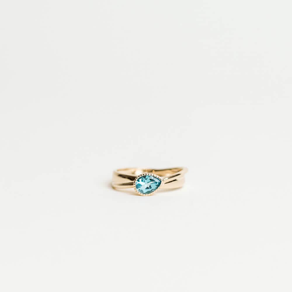 Pear Shape Swiss Blue Topaz Ring - 10KT Yellow Gold