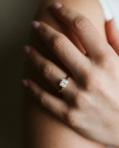 Semi- bezel Solitaire Engagement Ring 1.50 Carat Lab-grown Emerald Cut Diamond | 14kt Yellow Gold